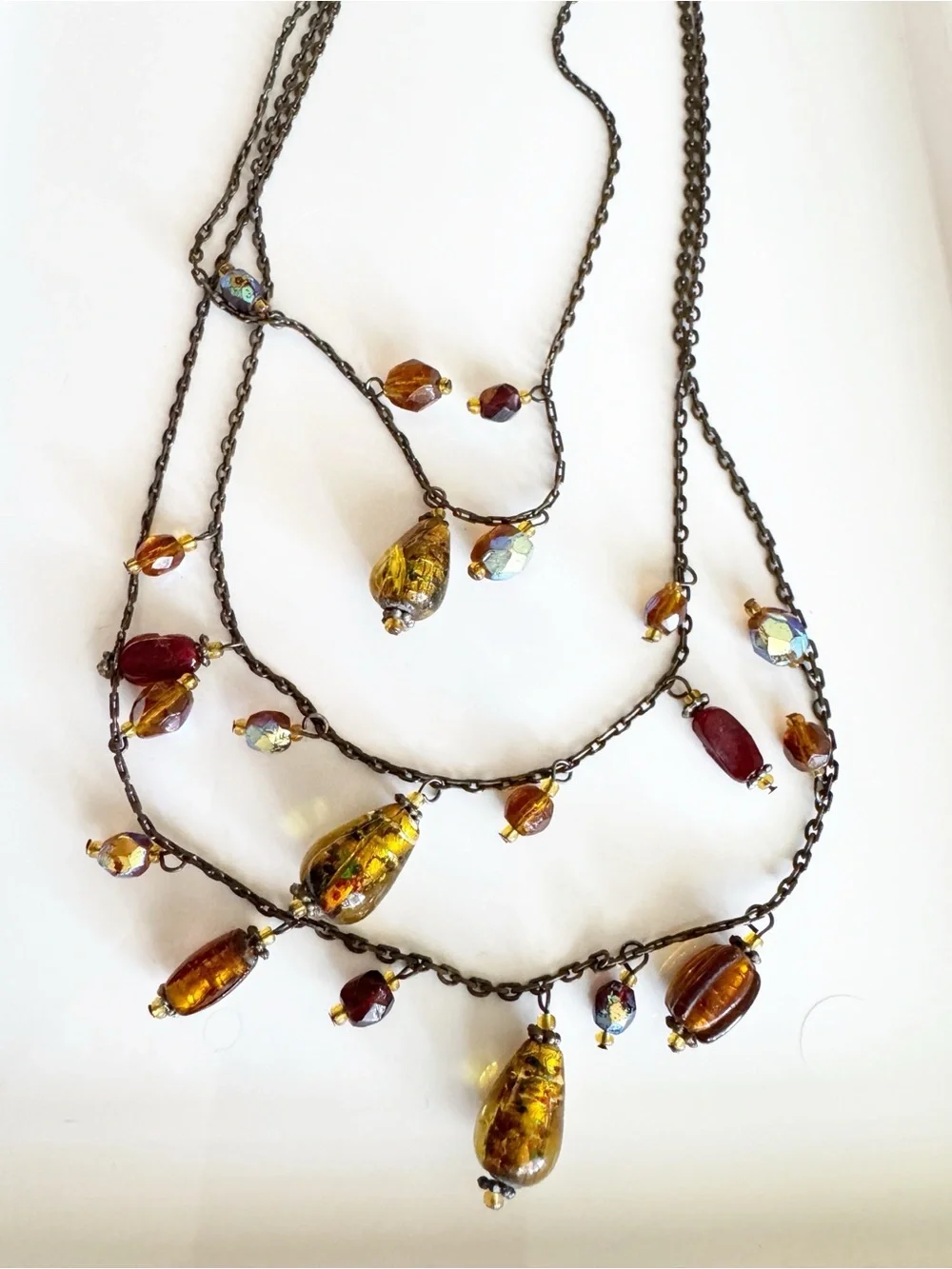 Multi-Layered Gold Tone Necklace with Iridescent Amber and Pink‎ Glass Drops
